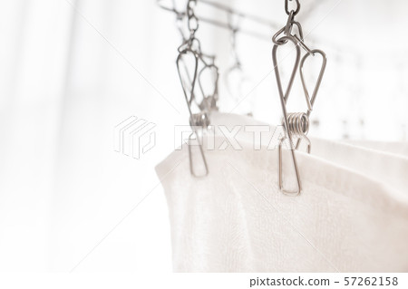 Dry the washed towels in the room. Dry the laundry indoors. Housework/daily life image. 57262158