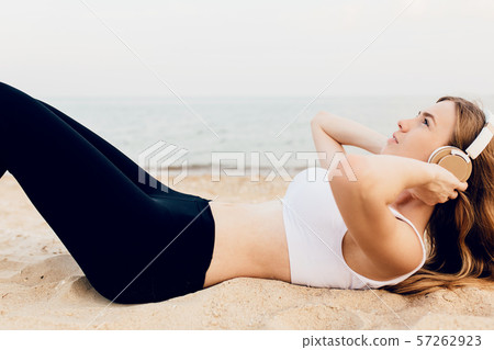 sporty girl doing exercises on the belly press, sporty girl doing exercises on the belly press, 57262923