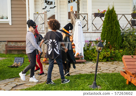 Kids Playing Halloween Games Outdoors 57263602