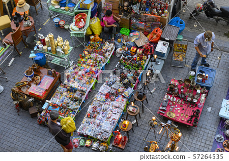 People walk the ancient market at Chatuchak Weekend Market People walk the ancient market at Chatuchak Weekend Market 57264535