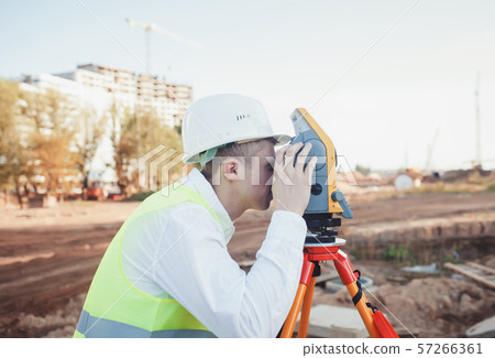 surveyor man in white helmet 57266361