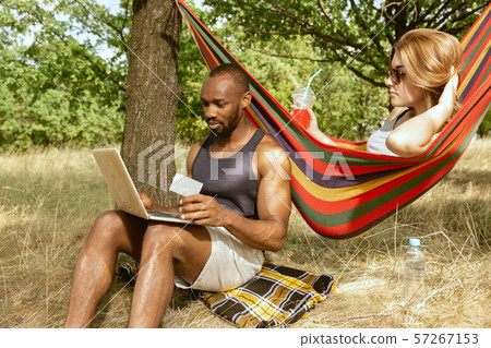 Young multiethnic international couple outdoors 57267153