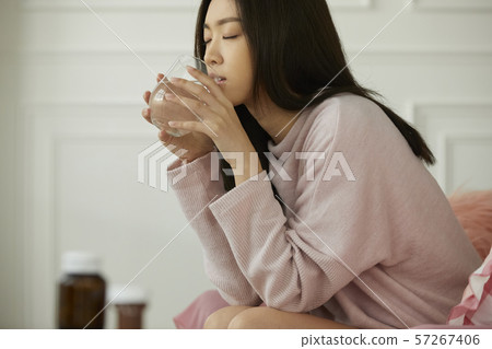 Woman poor health 57267406