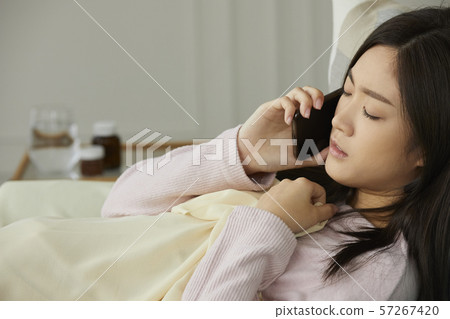 Woman poor health Woman poor health 57267420