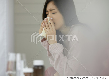 Woman poor health 57267617