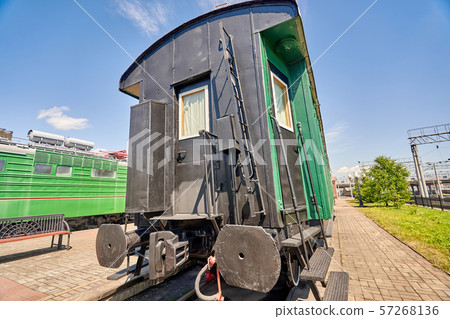 Old railway carriage on rails, close-up 57268136