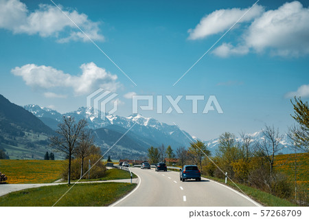 Car driving on the highway with mountains 57268709