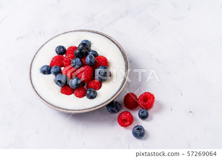 Tasty fresh blueberry raspberries yoghurt shake 57269064
