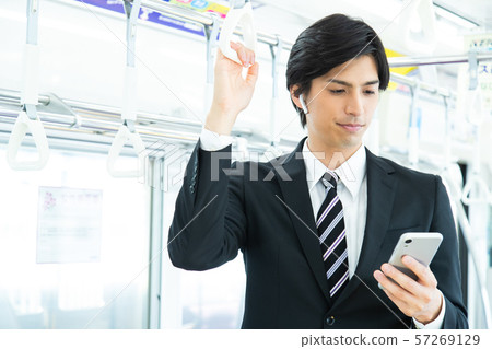 Commuter male train businessman shooting cooperation: Keio Electric Railway Co., Ltd. 57269129