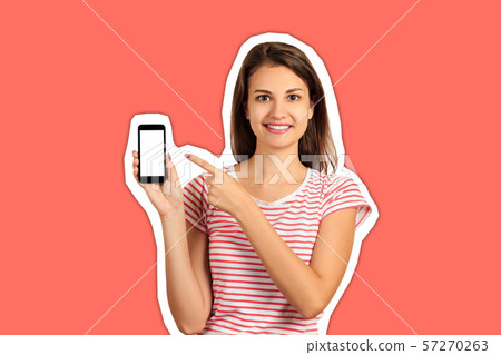 Happy beautiful young woman with long hair holding Happy beautiful young woman with long hair holding 57270263