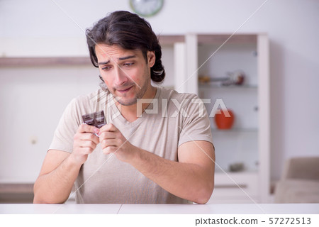 Young man suffering from allergy Young man suffering from allergy 57272513