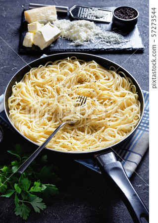 cacio e pepe in a skillet, top view cacio e pepe in a skillet, top view 57273544