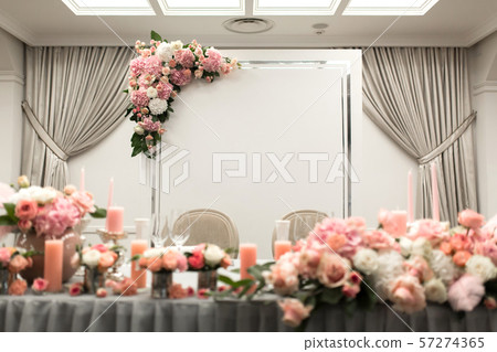 The table for the newlyweds is decorated with The table for the newlyweds is decorated with 57274365