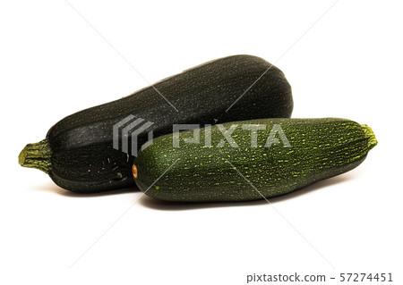 Two green zucchini, isolated on white background Two green zucchini, isolated on white background 57274451