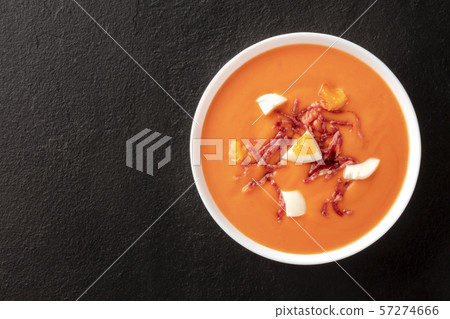 Salmorejo, Spanish cold tomato soup, top shot on a black background with copy space 57274666