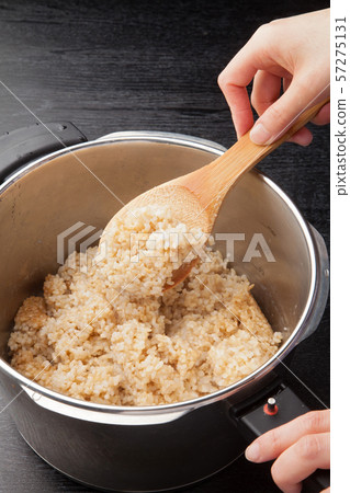 Brown rice cooked in a pressure cooker 57275131