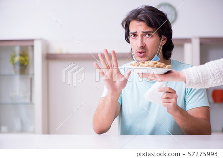 Young man suffering from allergy Young man suffering from allergy 57275993