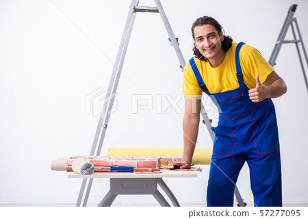 Young man contractor doing renovation at home Young man contractor doing renovation at home 57277095