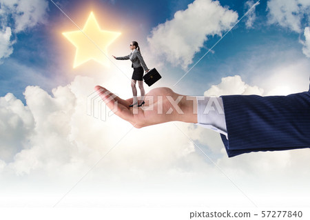 Hand holding businesswoman in success and promotion concept Hand holding businesswoman in success and promotion concept 57277840