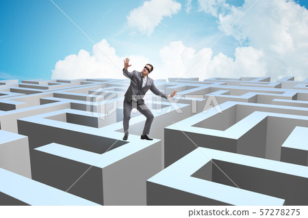 Businessman trying to escape from maze Businessman trying to escape from maze 57278275