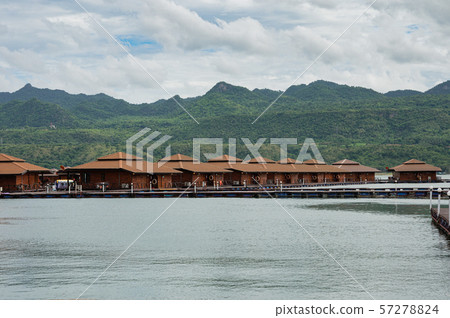 Wooden raft resort floating with mountain on dam 57278824