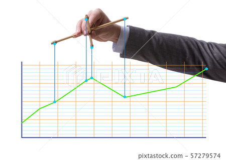Businessman controlling the market with strings Businessman controlling the market with strings 57279574