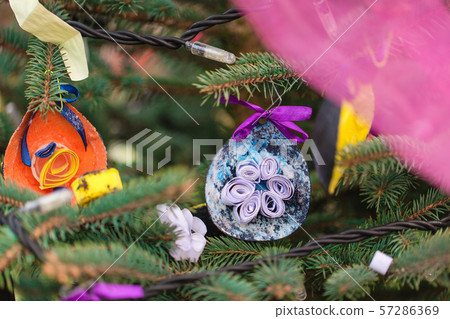 DIY handmade decoration on a Christmas tree DIY handmade decoration on a Christmas tree 57286369