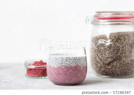 Chia pudding with almond milk, yogurt, pitaya powder Chia pudding with almond milk, yogurt, pitaya powder 57286397