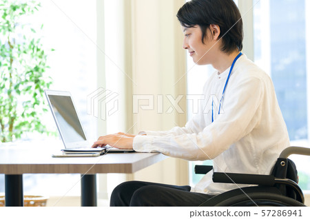 Wheelchair business man desk work Wheelchair business man desk work 57286941