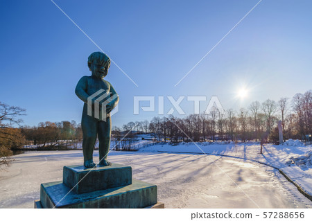 Oslo winter landscape at Vigeland Sculpture Park with statue 57288656