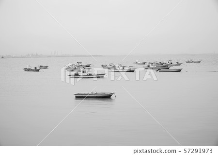 Ships standing in a peaceful sea 57291973