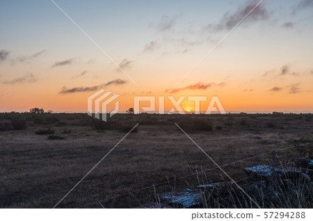 Sunrise in a great plain pastureland Sunrise in a great plain pastureland 57294288