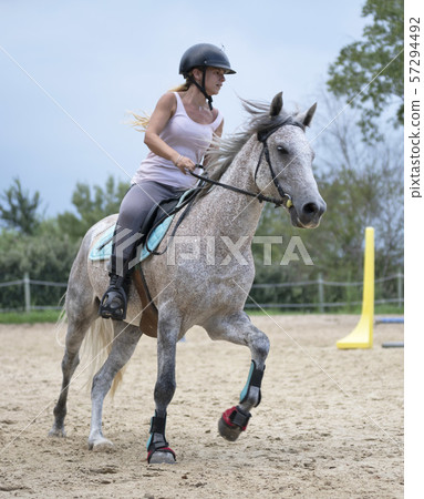 riding girl and horse 57294492