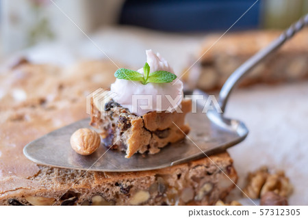 Healthy nutritious breakfast with homemade walnut bread. Healthy nutritious breakfast with homemade walnut bread. 57312305