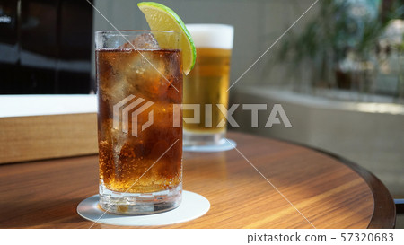 Cheers with lamb coke and beer 57320683