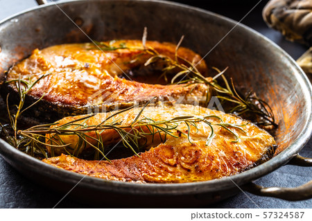 Salmon roasted steaks rosemary sal pepper olive 57324587