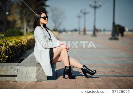 beautiful girl with brunette hair, posing outside, hipster style beautiful girl with brunette hair, posing outside, hipster style 57326065