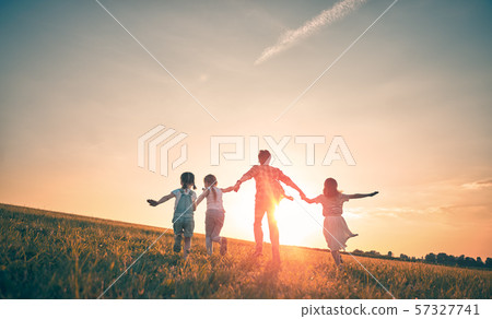 Happy family on autumn walk Happy family on autumn walk 57327741