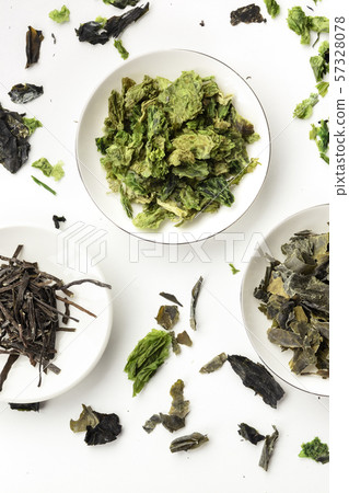Dry seaweed, sea vegetables, shot from above on white. Superfoods background 57328078