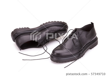 Scattered men's shoes with lace. Scattered men's shoes with lace. 57349710