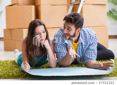 Young family planning home refurbishing in DIY concept 57352101