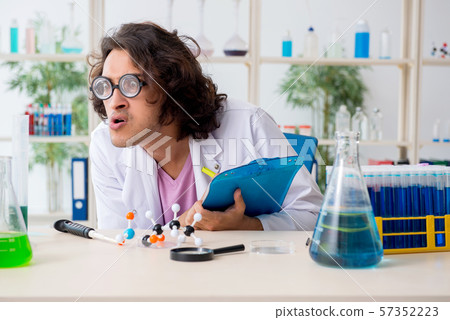 Funny male chemist working in the lab Funny male chemist working in the lab 57352223