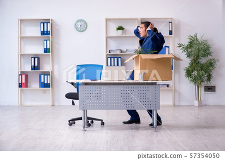 Young employee being made redundant Young employee being made redundant 57354050