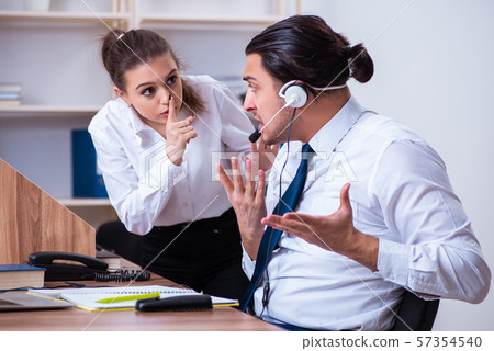 Call center operators working in the office 57354540