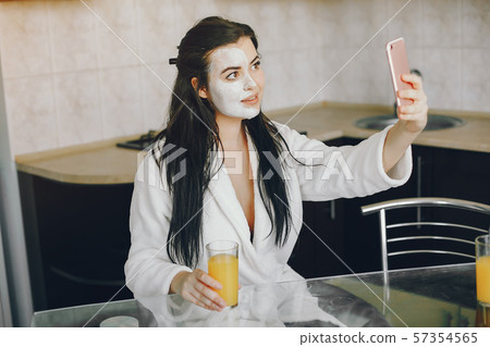 girl in a white dressing gown 57354565