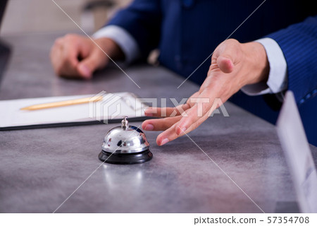 Hotel reception bell at the counter 57354708