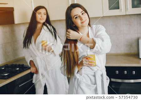 two girls with juice 57354730