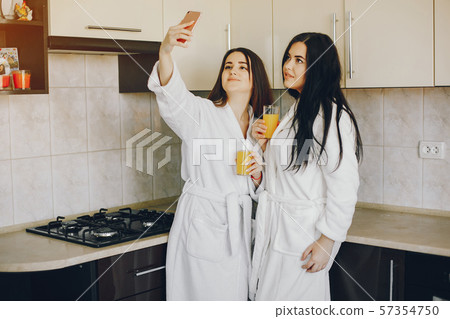 two girls with juice 57354750