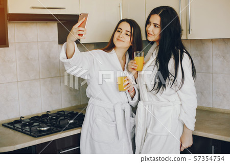 two girls with juice 57354754