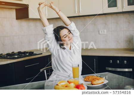 girl in a white dressing gown girl in a white dressing gown 57354816